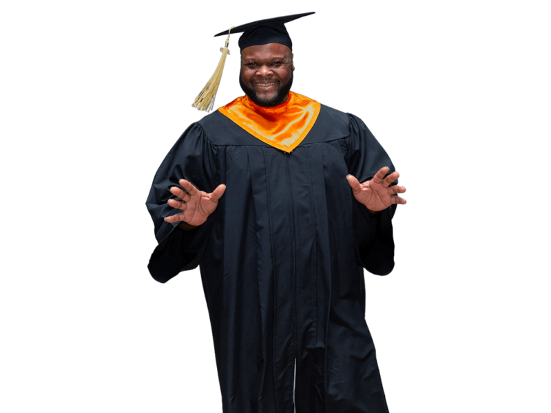 Smiling graduate in cap and gown celebrating achievement