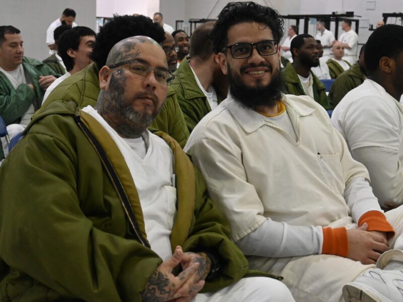PEP participants seated and engaged during a Prison Entrepreneurship Program event inside a correctional facility