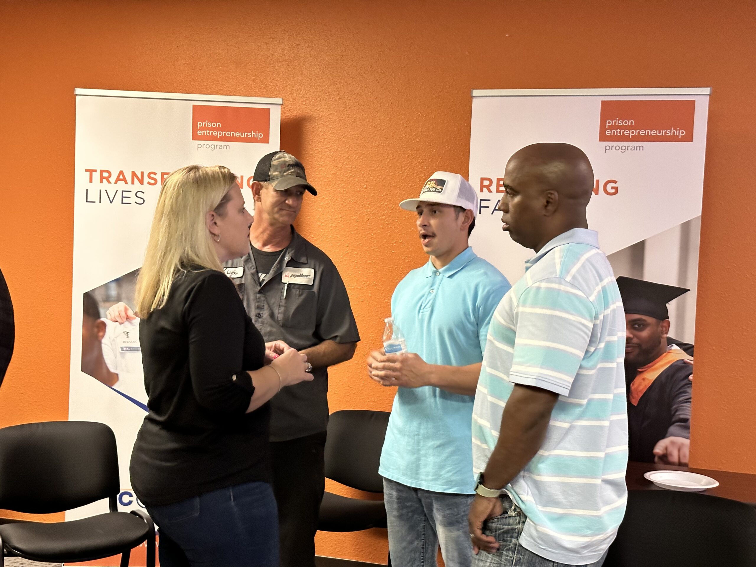 Prison Entrepreneurship Program graduates and supporters connect during a reentry networking event focused on restoring families and transforming lives