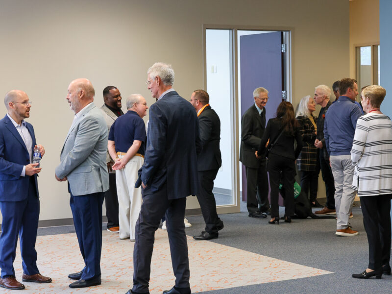 Community and business leaders gather for a Prison Entrepreneurship Program event supporting reentry, mentorship, and second chances