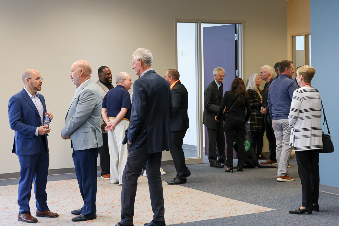 Community and business leaders gather for a Prison Entrepreneurship Program event supporting reentry, mentorship, and second chances