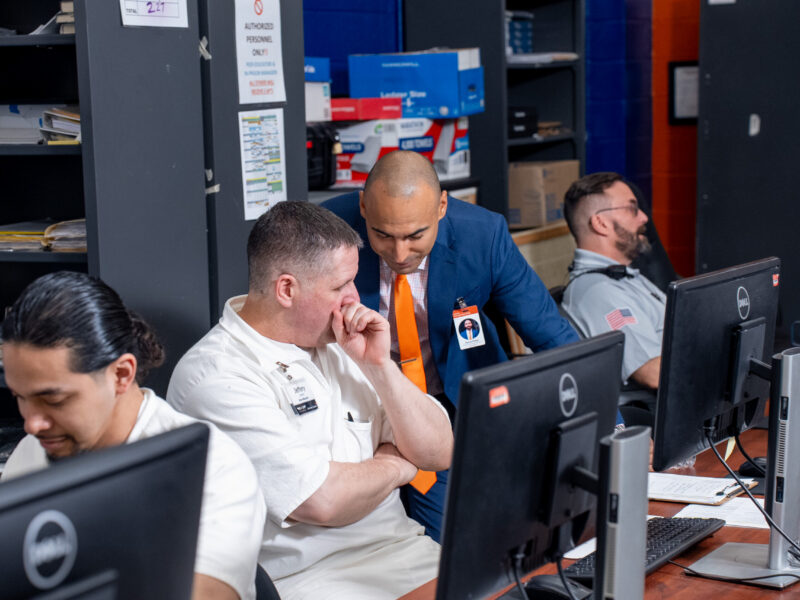 Prison Entrepreneurship Program participant receives one on one mentorship from a business leader, building job readiness, professional skills, and pathways to successful reentry